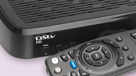 DSTV HD decoder hardware professional installation showing decoder, smart card and HDMI cable for high-definition setup in Pretoria home