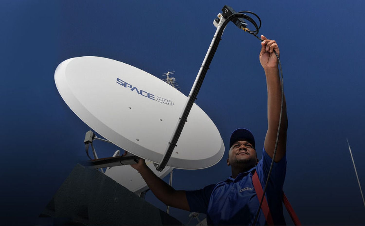 DSTV relocation technician removing satellite dish at old property for safe transport and reinstallation in Centurion