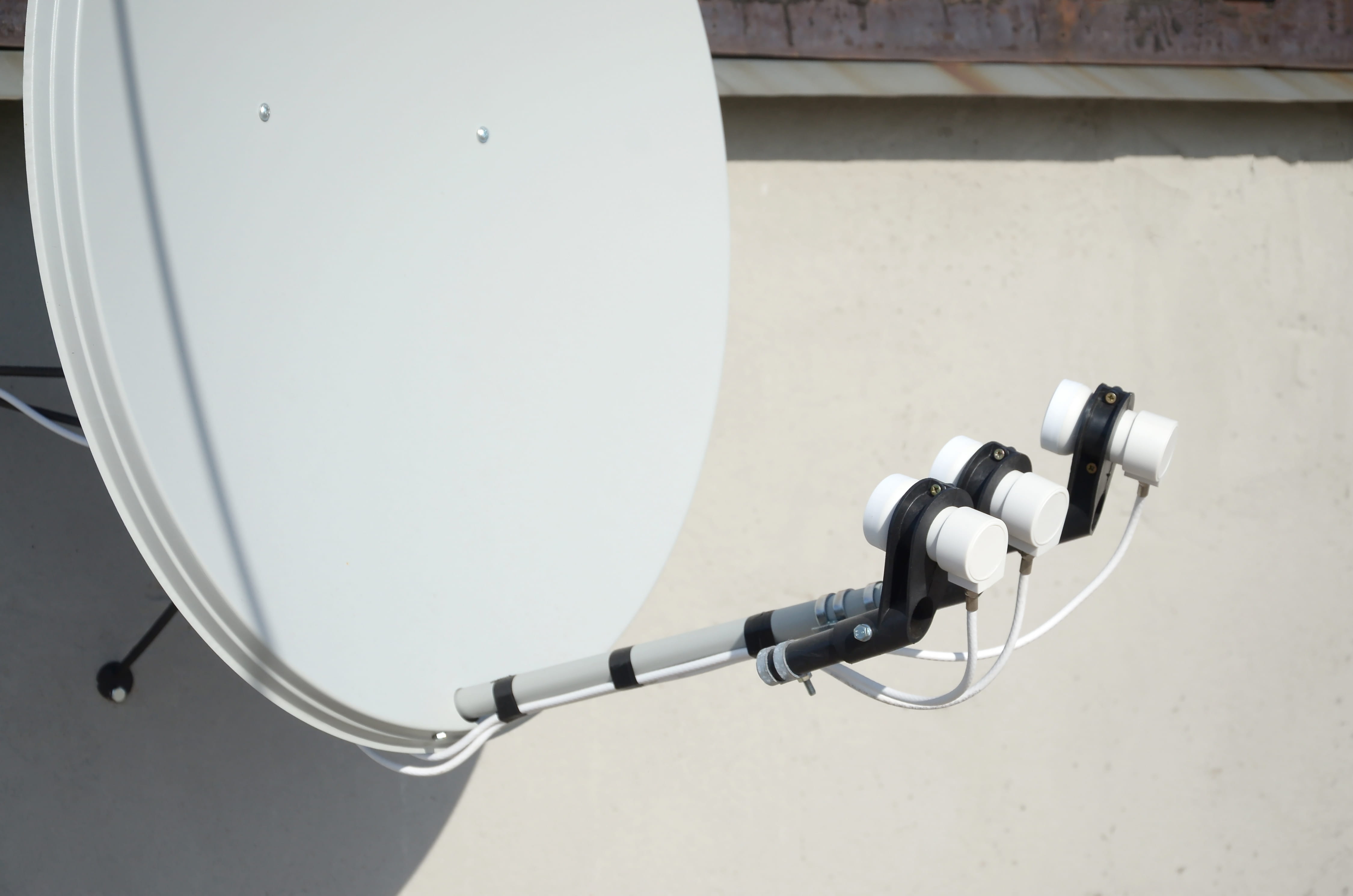 Smart SCD2 LNB with multiple outputs mounted on a residential DSTV dish in Gauteng